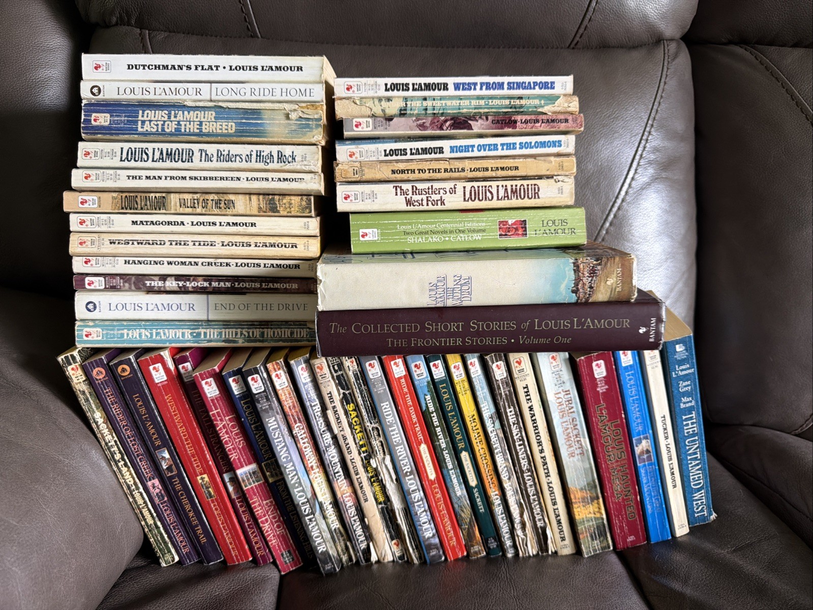 Lot of 47 Louis L’amour Paperback Novels,Short Stories Hardback Sackett